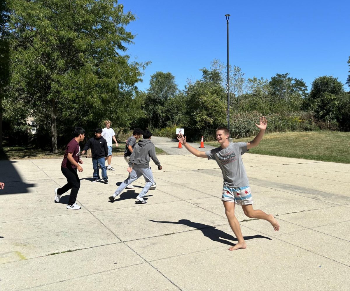 Students playing soccer during lunch.