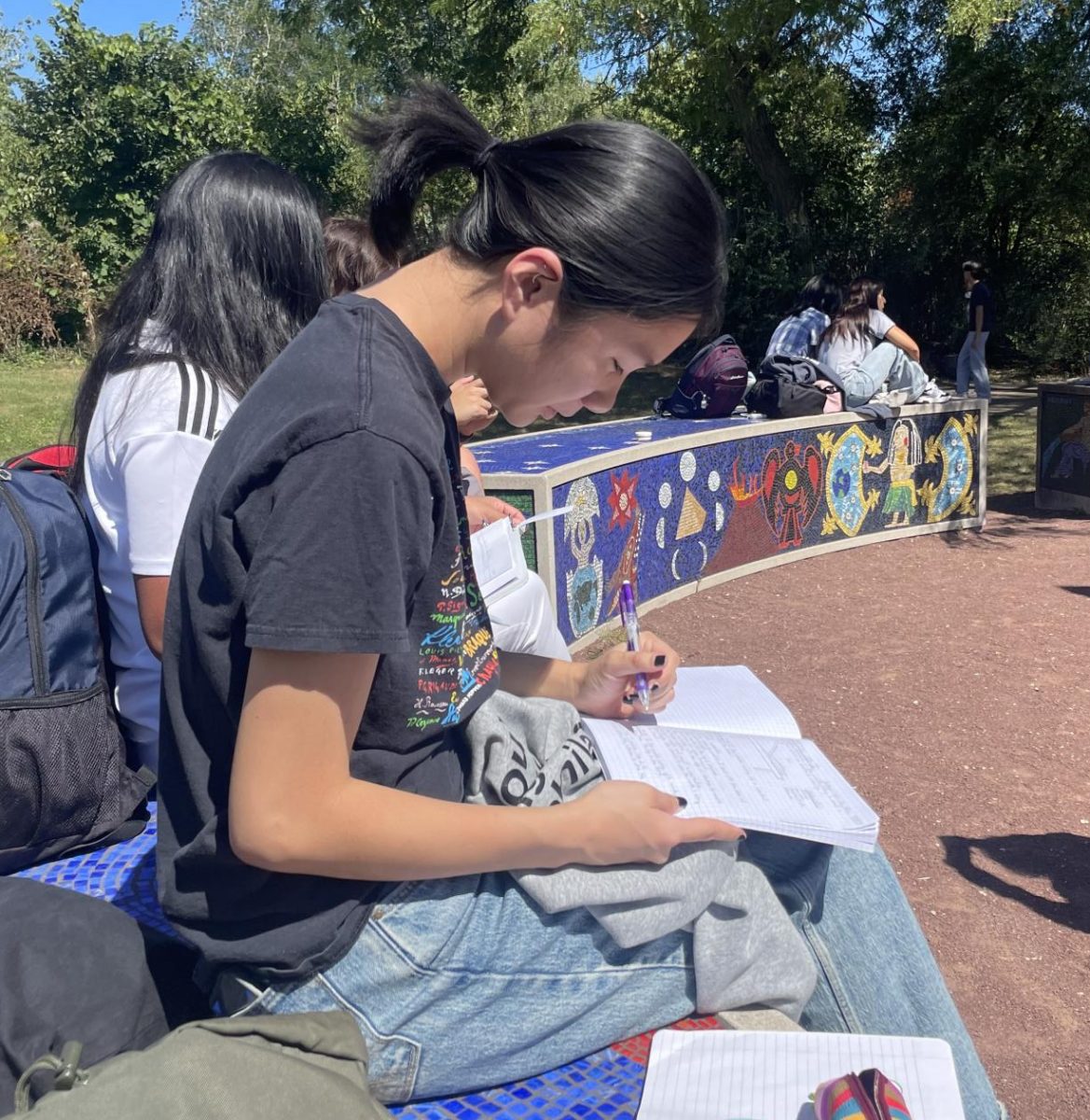 Senior Noa Tschoe (Adv. 505) getting ahead on some homework at lunch. 