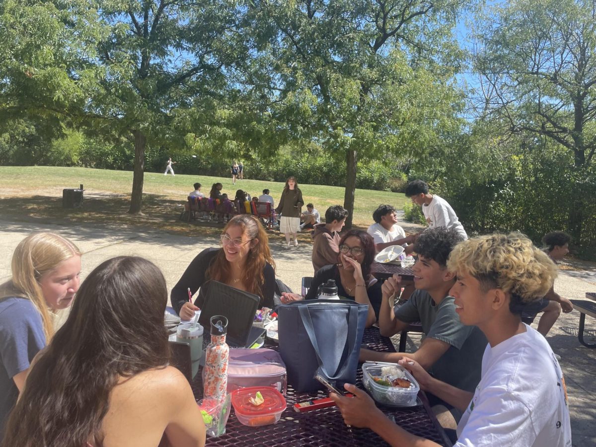 Friends sitting outside for lunch on a lovely day