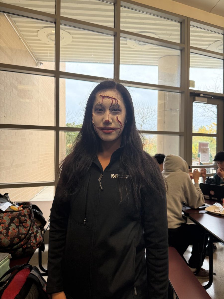 Angela Wang (Senior) shows off her Halloween makeup.