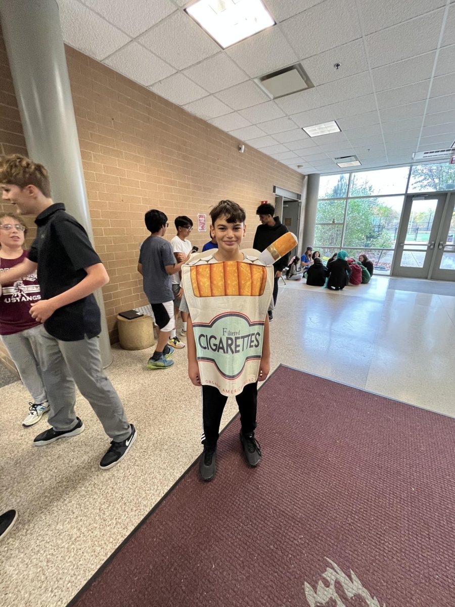 Ashton Alvarez dressed as a carton of cigarettes