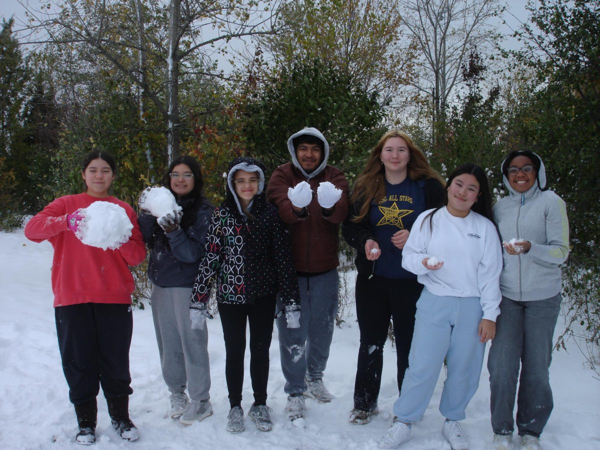 Students in Northside's backyard in the snow during lunch