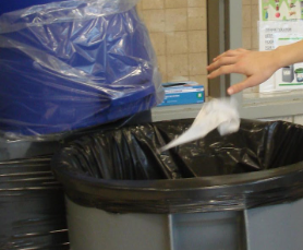 Student throwing away trash