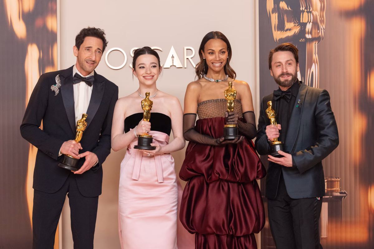 2025 Oscar winners celebrate together at last year's Academy Awards ceremony. 