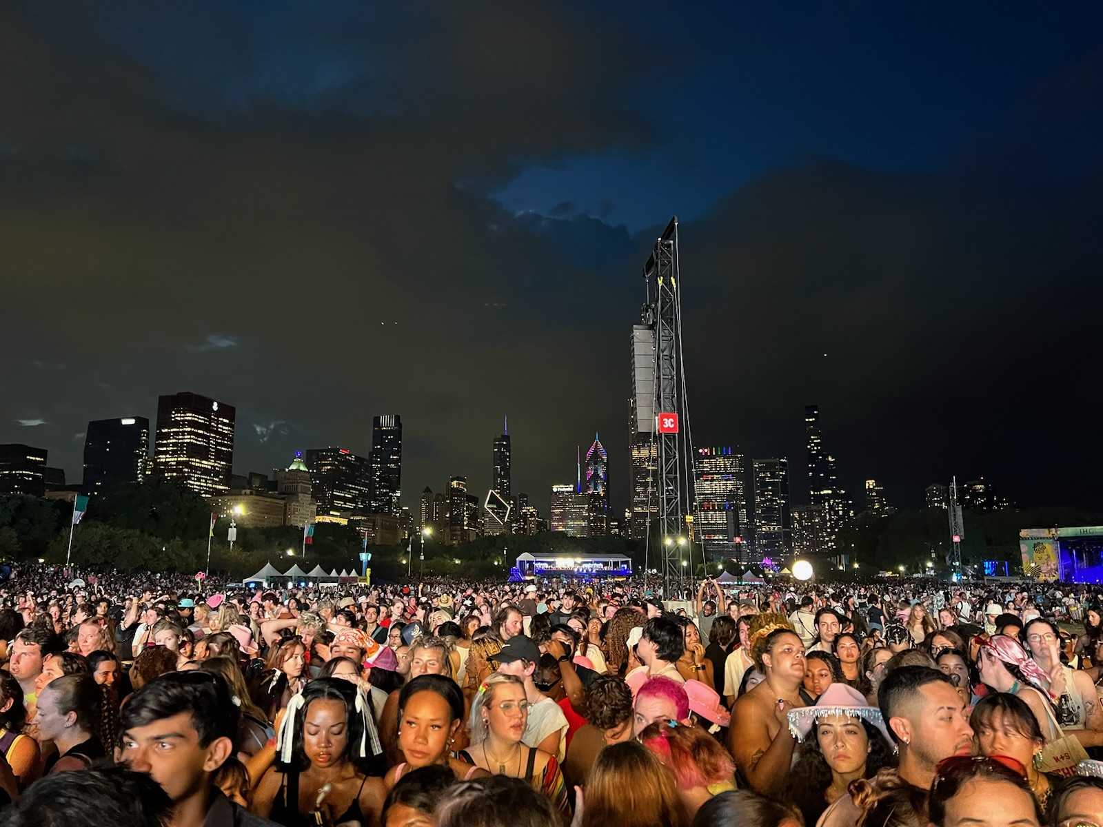 Lollapalooza crowd with Chicago skyline.